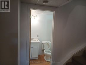 Guelph (Kortright West) apartment for rent - A bathroom with a toilet and sink is shown.