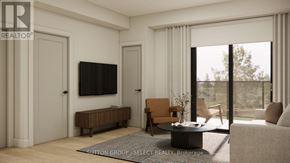 Goderich (Goderich (Town)) condo for rent - A modern living room with a flat screen TV and a glass door leading to a balcony.