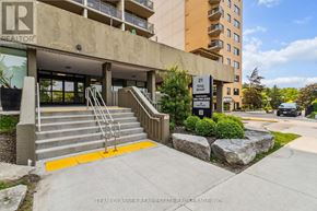 London East (East K) condo for rent - A building with a glass door entrance and a sign that says "REALTOR".