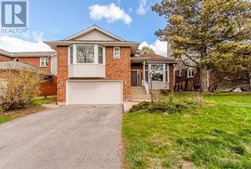 Ottawa apartment for rent - A house with a garage is for sale.