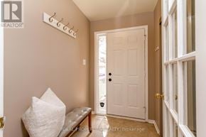 Ottawa apartment for rent - A white door is open to a hallway.