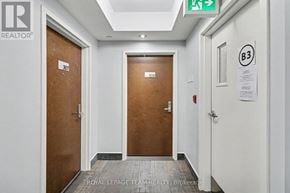 Ottawa condo for rent - A hallway with doors 370 and 372 and a sign for B3.