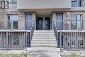 Cambridge townhouse for rent - The front of a building with a sign that says "REALTOR" on the top left corner.