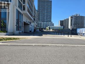 Toronto (Newtonbrook East) condo for rent - A street view with buildings and a sign that says REALTOR.