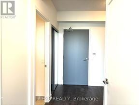 Toronto (Banbury-Don Mills) condo for rent - A room with a blue door and a white door.