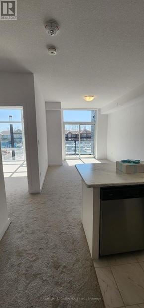 Hamilton (Waterdown) condo for rent - A room with a white ceiling and a window.