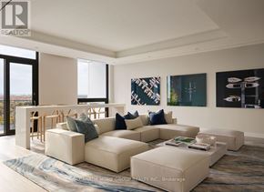Mississauga (Port Credit) condo for rent - A living room with a large sectional sofa and a coffee table.