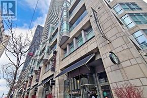 Toronto (Mount Pleasant West) condo for rent - A tall building with a Starbucks on the ground floor.