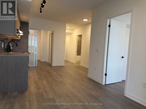 Burlington (Alton) condo for rent - A kitchen area with a sink and a countertop.
