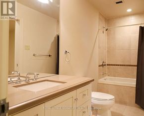 Toronto (Church-Yonge Corridor) condo for rent - A bathroom with a toilet, sink, and bathtub.