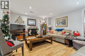Hamilton apartment for rent - A living room with a Christmas tree and a fireplace.