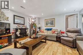Hamilton apartment for rent - A living room with a fireplace and a couch.