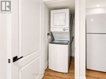 Oakville (Wm Westmount) apartment for rent - A white dishwasher is in a small kitchen.