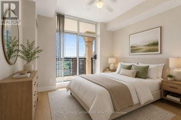 Toronto (Banbury-Don Mills) condo for rent - A bedroom with a large bed, a dresser, and a painting on the wall.