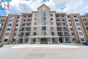 Waterloo condo for rent - A large apartment building with the number 778 on the front.