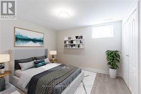 Hamilton (Westcliffe) apartment for rent - A bedroom with a large bed and a painting on the wall.