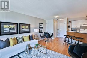 Toronto (Bay Street Corridor) condo for rent - A living room with a white couch and a glass coffee table.