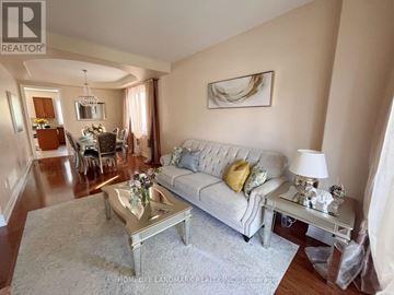 Oakville (Wm Westmount) apartment for rent - A living room with a white couch and a coffee table.