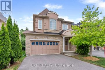 Richmond Hill (Oak Ridges Lake Wilcox) apartment for rent - A house with a brown garage door is for sale.