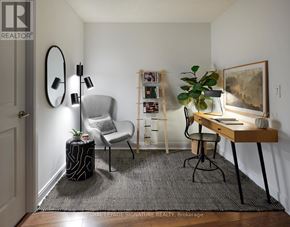 Toronto (Willowdale East) condo for rent - A room with a desk, chair, and a plant.