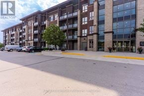 Burlington (Uptown) condo for rent - A building with the RE/MAX Escarpment Realty Inc. logo on it.