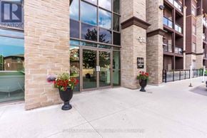 Burlington (Uptown) condo for rent - The image shows a building with a glass door and a sign that reads "REALTOR".