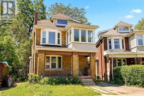 Hamilton (Crown Point) apartment for rent - A two-story house with a red brick exterior and a white trim.