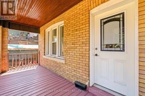 Hamilton (Crown Point) apartment for rent - A balcony with a white door and a window.