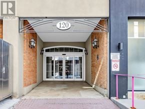 Toronto (Kensington-Chinatown) condo for rent - The entrance to a building with a sign that reads "120" above the door.