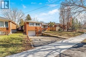 Toronto (Kingsview Village-The Westway) apartment for rent - A residential area with houses and a clear sky.