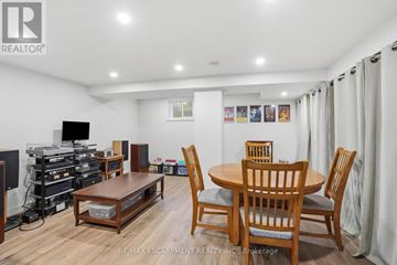 Burlington (Roseland) apartment for rent - A living room with a wooden table and chairs.