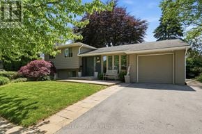 Burlington (Roseland) apartment for rent - A house with a driveway in front of it.