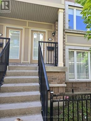 Mississauga (Churchill Meadows) house for rent - A house with a black railing and a sign that says REALTOR.