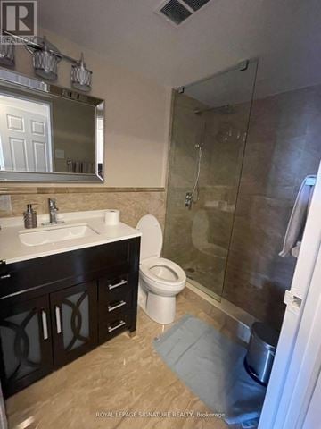 Markham (Royal Orchard) condo for rent - A bathroom with a sink, toilet, and shower.