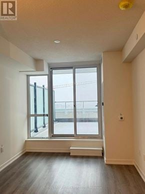 Vaughan (Vaughan Corporate Centre) condo for rent - A realtor logo is on the top left corner of the image.