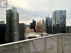 Toronto (Waterfront Communities) condo for rent - A cityscape with a construction site in the foreground.