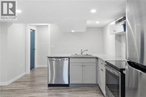 Caledonia apartment for rent - A modern kitchen with stainless steel appliances and a marble countertop.
