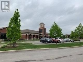 Brampton (Sandringham-Wellington) townhouse for rent - A church with a parking lot in front of it.