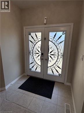 Hamilton apartment for rent - A double door with a glass window and a metal frame.
