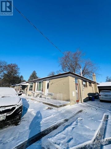 Richmond Hill (Crosby) apartment for rent - A house with a car parked in front of it.