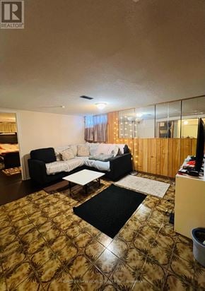 Richmond Hill (Crosby) apartment for rent - A living room with a couch, coffee table, and a rug.