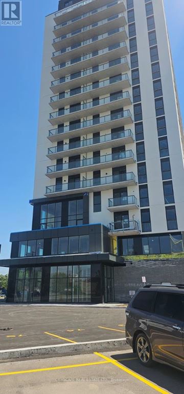 Brantford condo for rent - A tall building with a balcony on the side.
