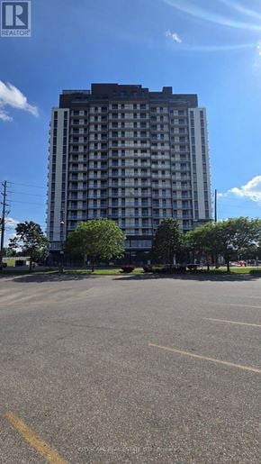 Brantford condo for rent - A kitchen with a stainless steel refrigerator, oven, and microwave.