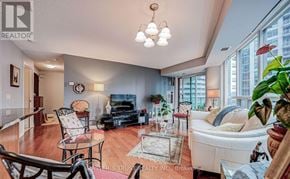 Toronto (Waterfront Communities) condo for rent - A living room with a sofa, chairs, and a coffee table.