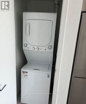 Oakville (Jm Joshua Meadows) condo for rent - A white dishwasher is in a kitchen.