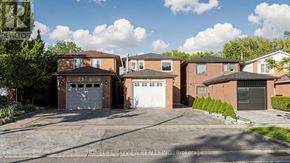 Richmond Hill (North Richvale) apartment for rent - A row of houses with garages in front of them.