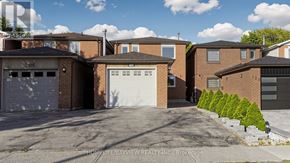 Richmond Hill (North Richvale) apartment for rent - A row of houses with garages numbered 101 and 102.