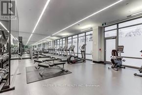 Toronto (Henry Farm) condo for rent - A gym with a variety of equipment including treadmills, weights, and exercise machines.