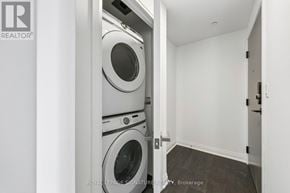 Mississauga (City Centre) condo for rent - A white washing machine and dryer in a small laundry room.