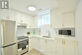 Hamilton (Landsdale) apartment for rent - A kitchen with white cabinets and appliances.